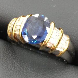 Pt900/K18 0.4ct サファイア付リング