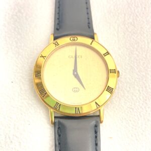 GUCCI 3000M ローマンベゼルクォーツ