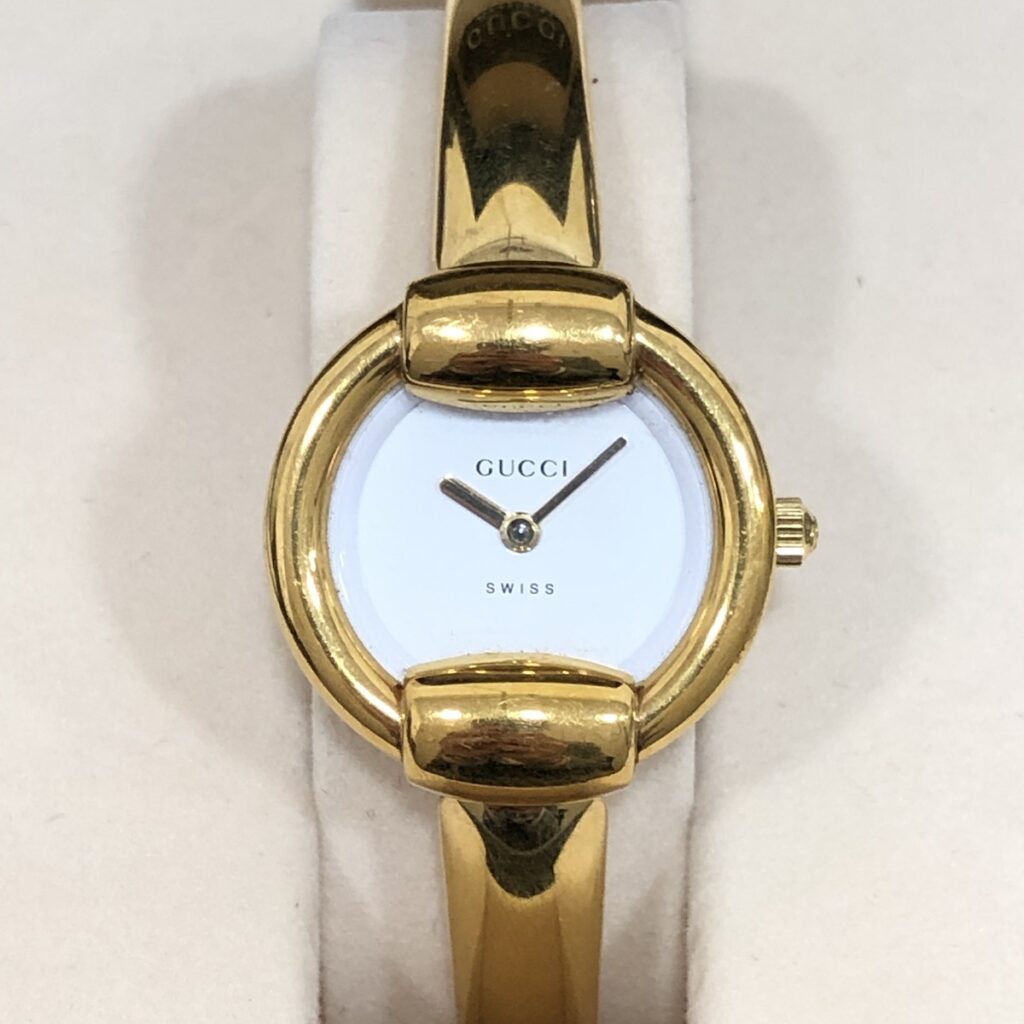GUCCI レディース腕時計 1400L ゴールドカラー ホワイト文字盤の買取