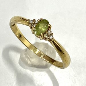 K18 ペリドット＆メレダイヤモンド付きリング