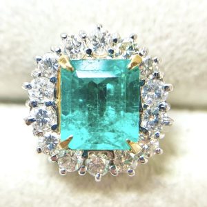 K18エメラルドメレダイヤ付きリング