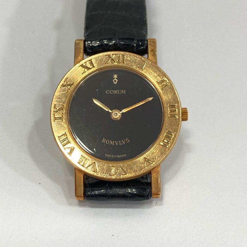 コルム 金無垢時計