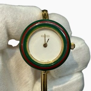 GUCCI（グッチ）ゴールドトーン チェンジベゼルウォッチ（型番：1112.2）